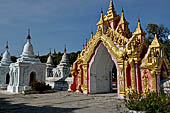 Myanmar - Mandalay, Kuthodaw Pagoda. 729 white pitaka pagodas contain the Tipitaka, the sacred texts of Theravada Buddhism. 